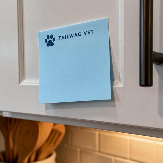 Customer photo of a branded sticky note on a cabinet